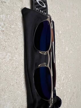 Oakley Silver Frame Sunglasses with Blue iridium Lenses and Brown Temples  rare